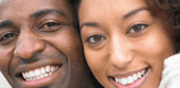 smiling black couple